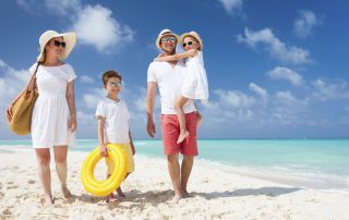 Family on a tropical beach vacation